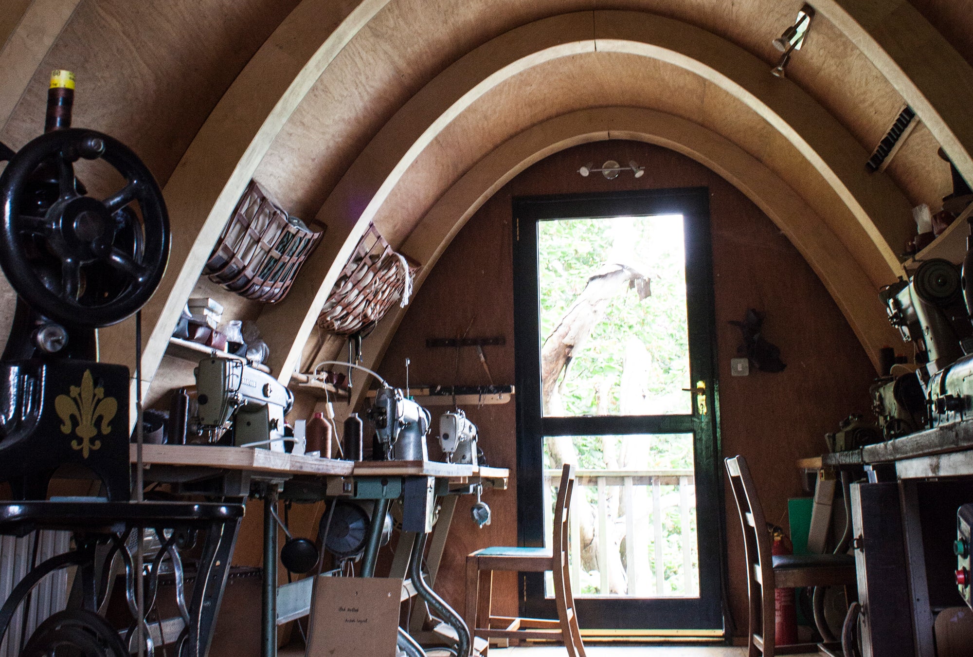 A small leather workshop with multiple sowing machines