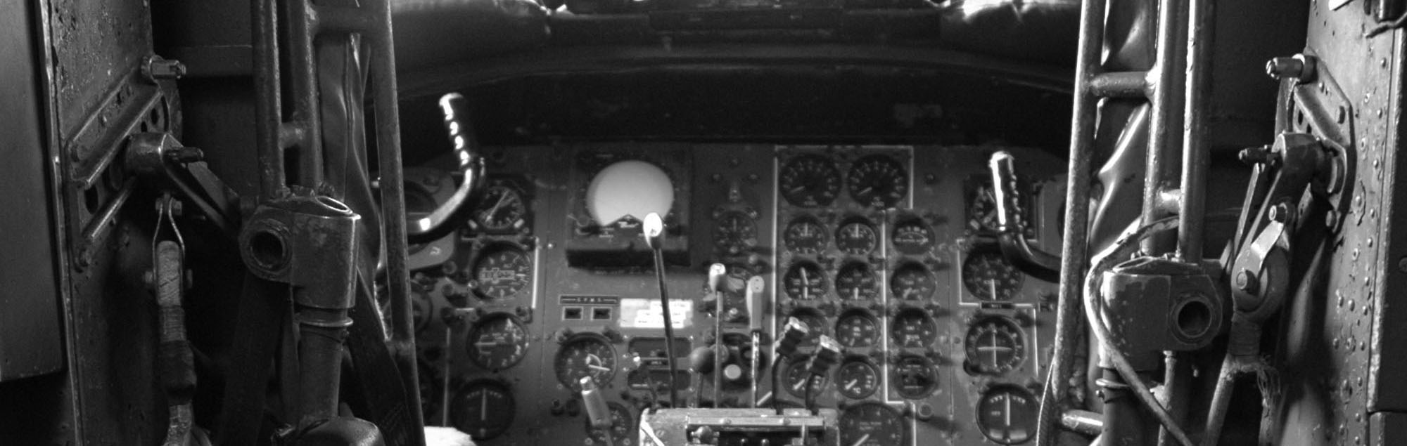 Old style aviation cockpit in back and white